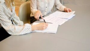 Lawyers Discussing Green Card Category E26
