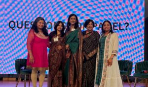 Group photo of speakers onstage at the Atlanta Indian Women’s Forum event